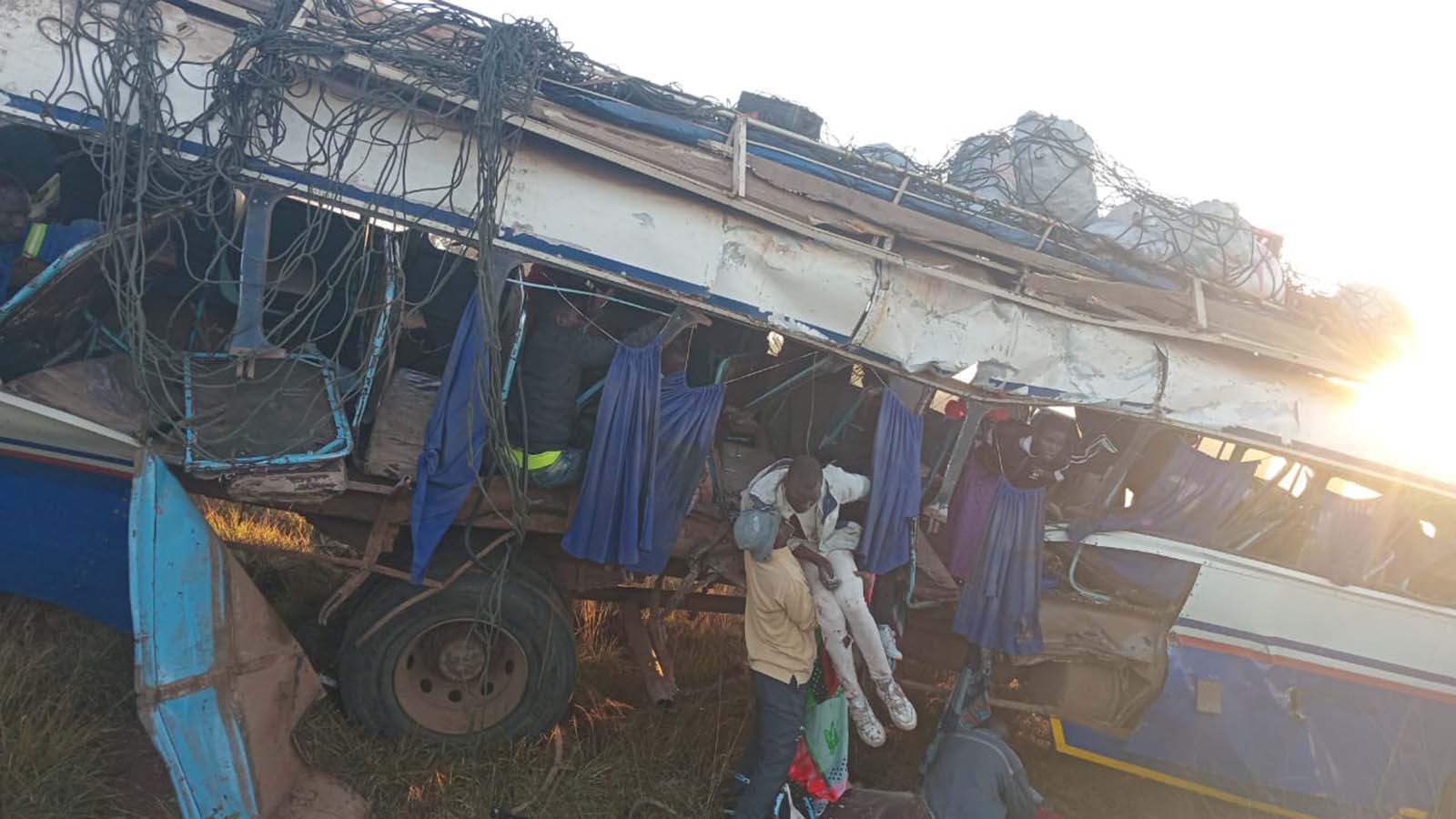 Nine killed, 26 injured as bus, train collide